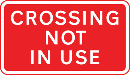 Crossing not in use sign
